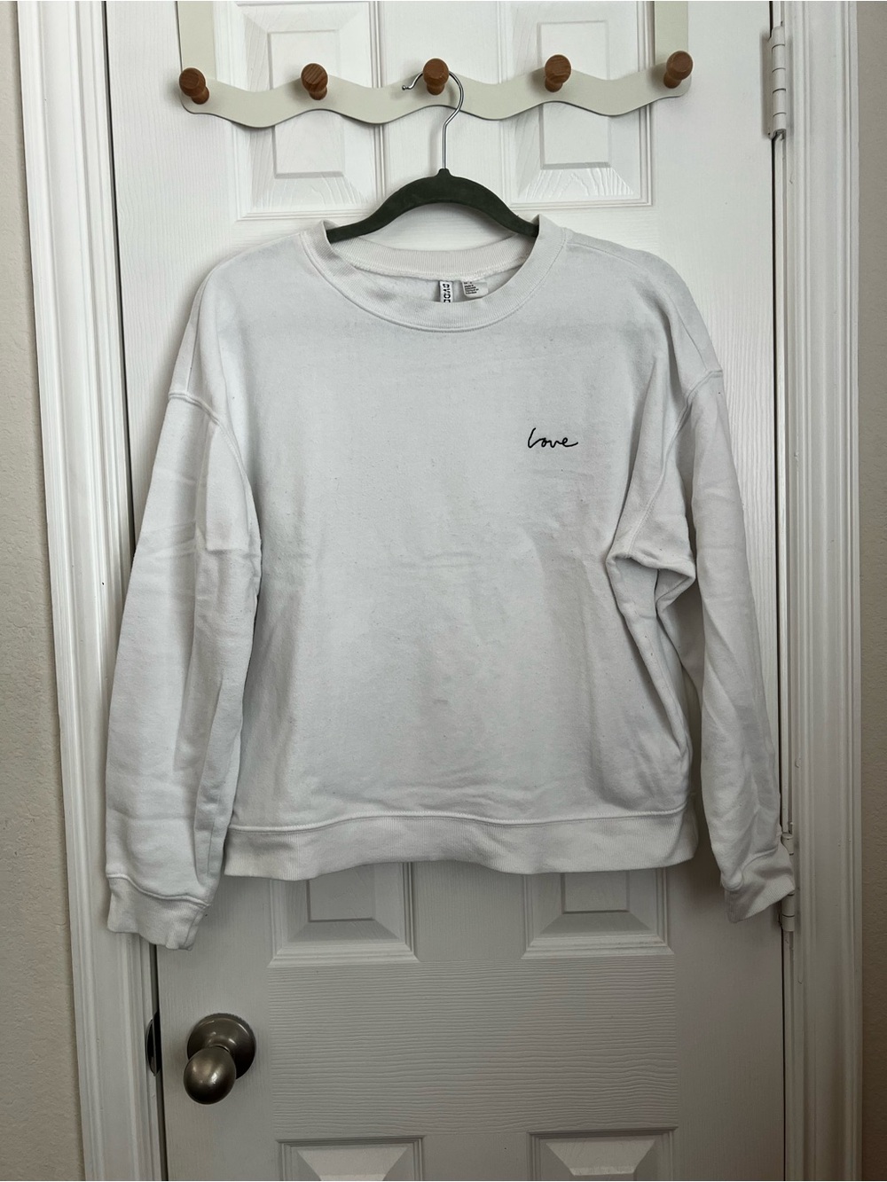 Divided White Crewneck Sweatshirt with 'Love' Script